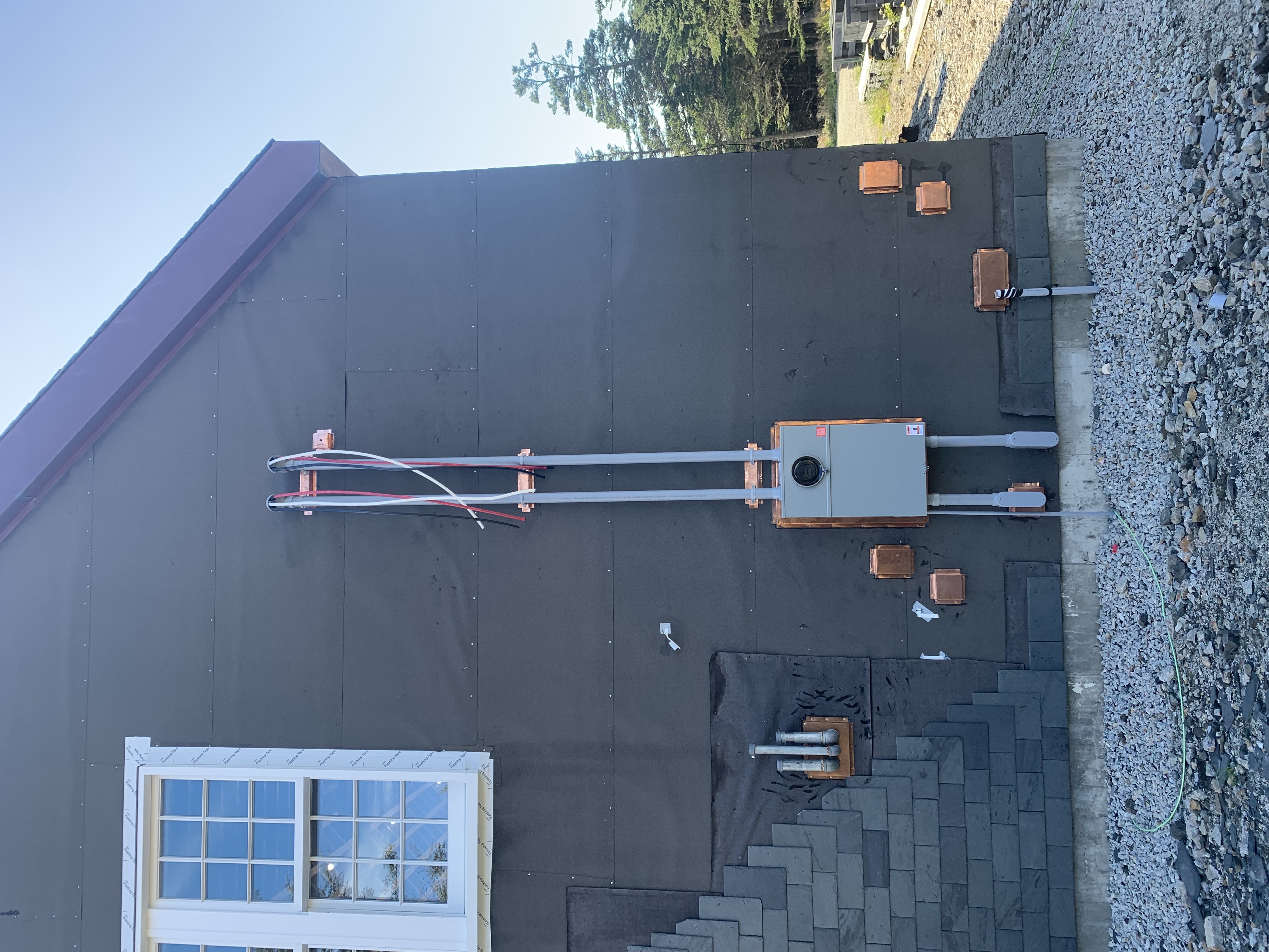 Custom 400 amp residential service installation with clean conduit layout and premium copper detailing