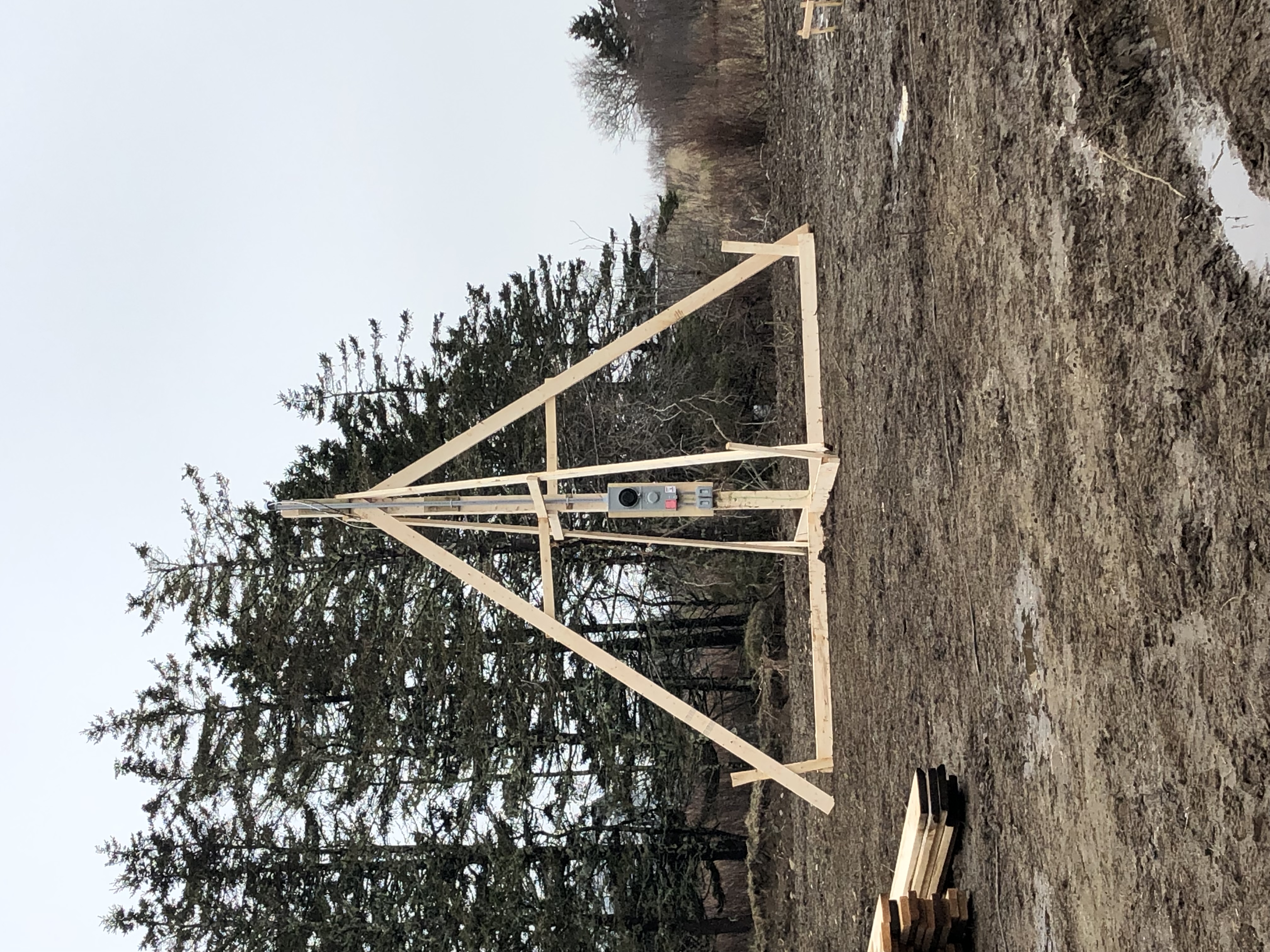 Temporary construction power setup showing code-compliant service pole, meter base, and site-ready electrical connection for jobsite use