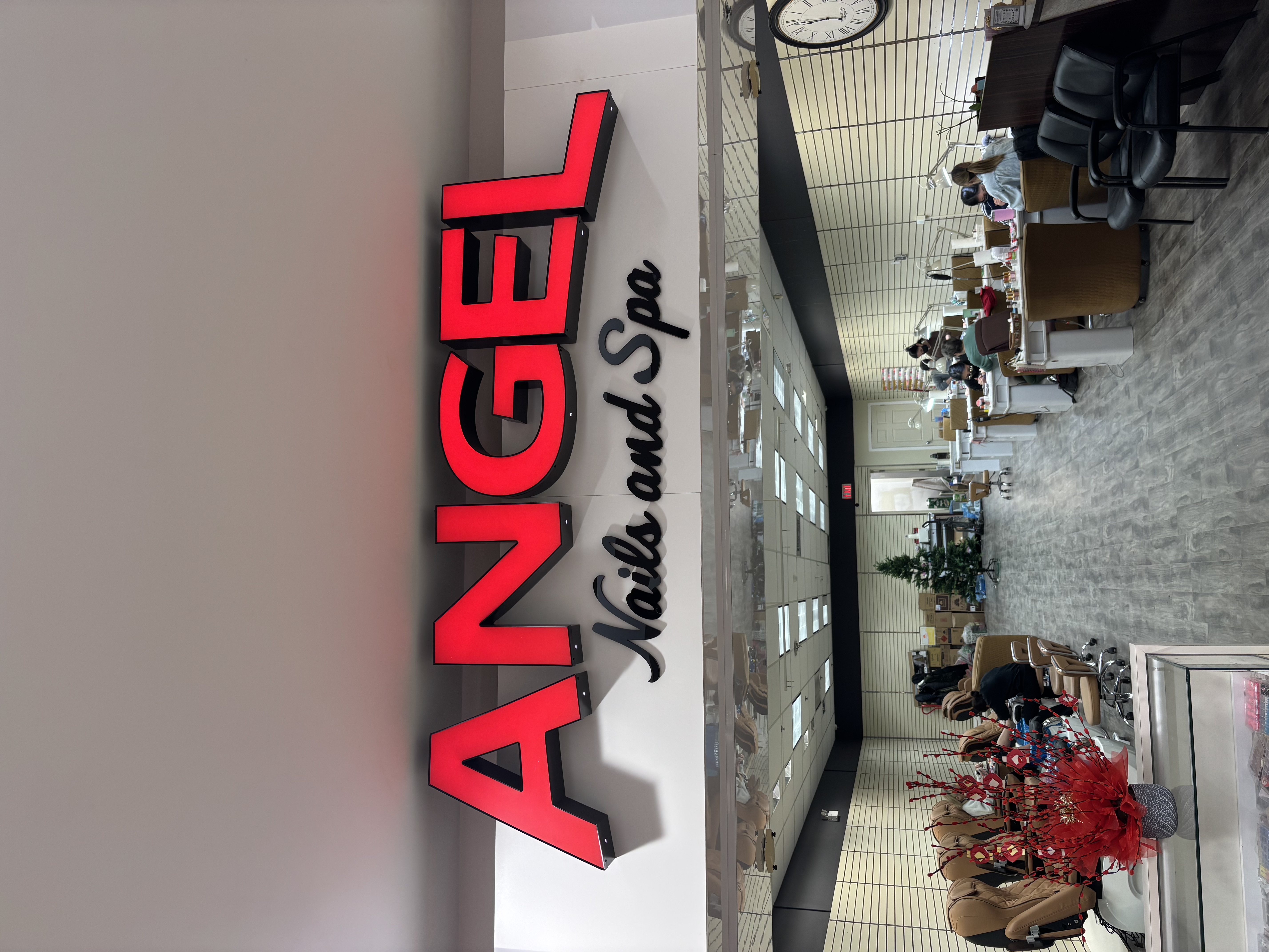 Finished illuminated storefront sign installation